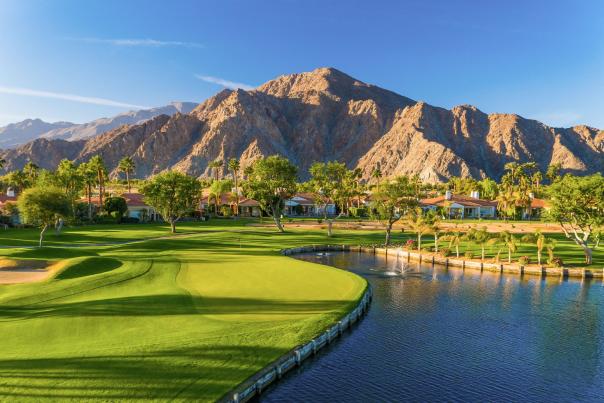 Golf Course and palm trees with a blue sky