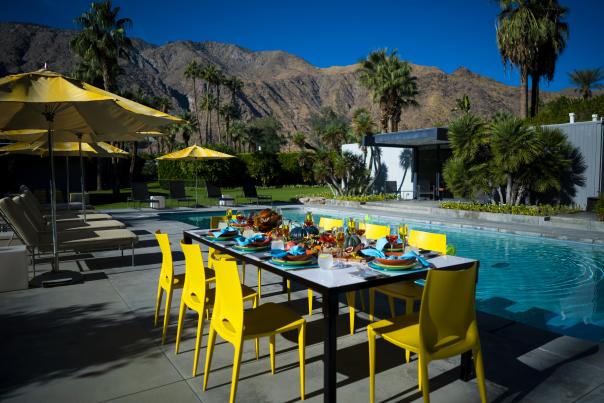 Thanksgiving by the pool with mountains and palm trees