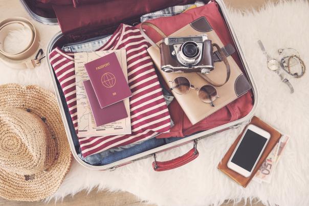 Suitcase packed with essentials for a Greater Palm Springs visit.