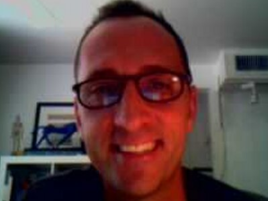 Guy with glasses smiling