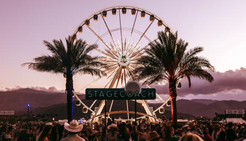 The Stagecoach sign with the ferris wheel and palm trees in the background.
