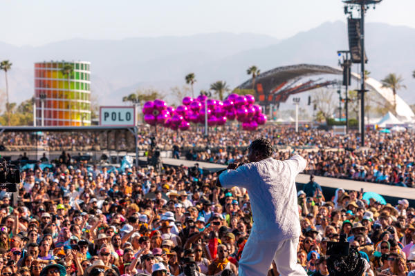 A massive crowd faces the main stage at Coachella 2023.