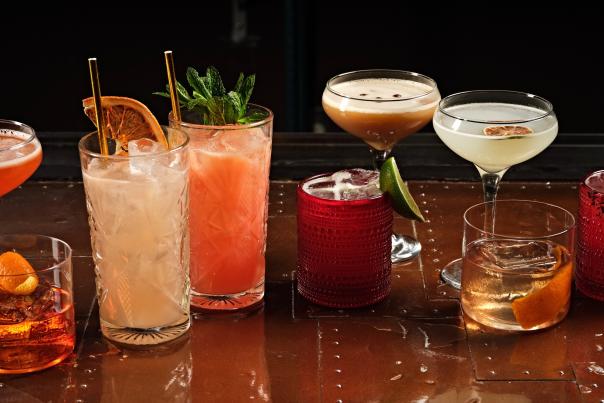 Various cocktails are lined up on a table at El Jefe at Saguaro in Palm Springs.