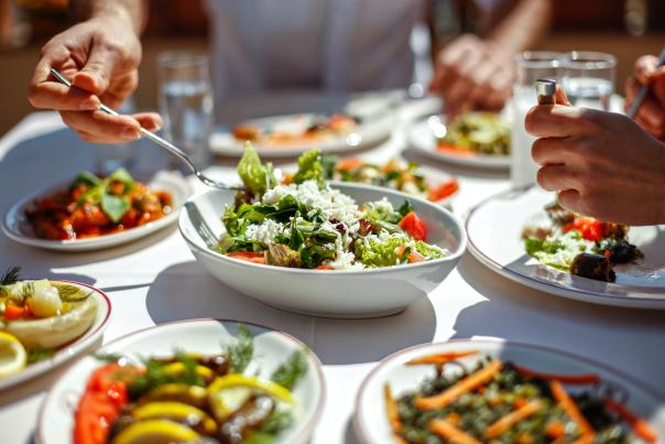 Table with a variety of food plates
