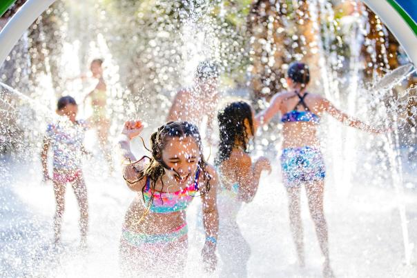 Children play in a splash pad at Hyatt Regency Indian Wells Resort & Spa.