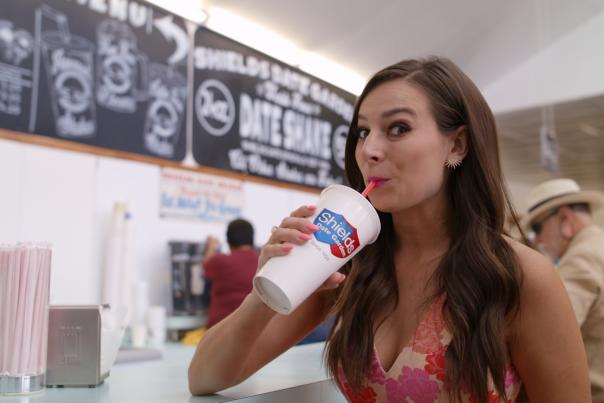 Alle Pierce drinking a date shake from Shield's.