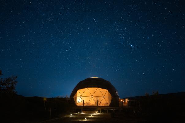 Geodome at Cascade Trails Mustang Sanctaury under the night sky in Joshua Tree National Park