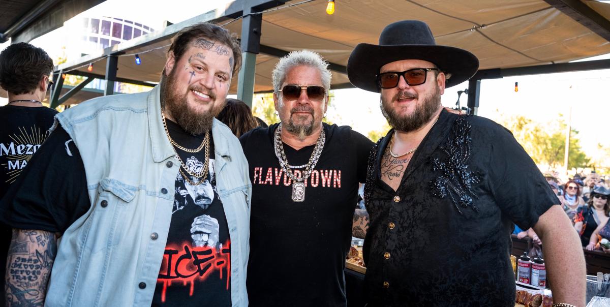 Jellyroll and Guy Fieri pose for a picture at Stagecoach.
