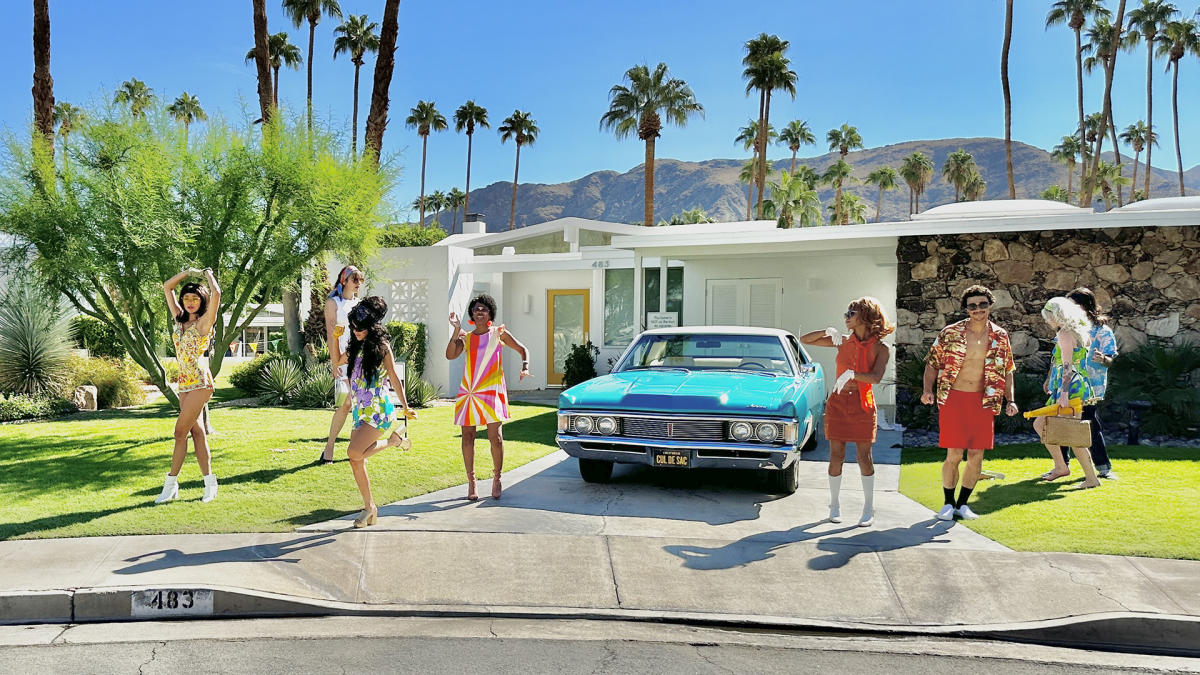 Dancers outside a home at the Cul de Sac Experience event part of Modernism Week - October.
