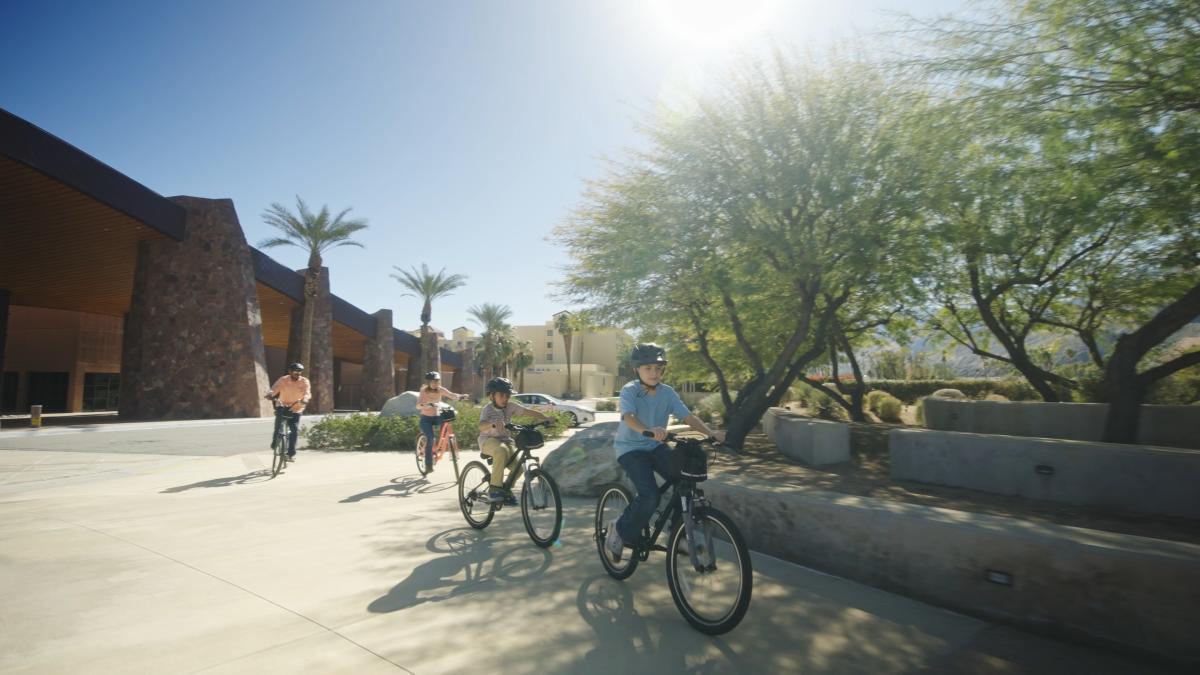 Family on bicycles in Greater Palm Springs