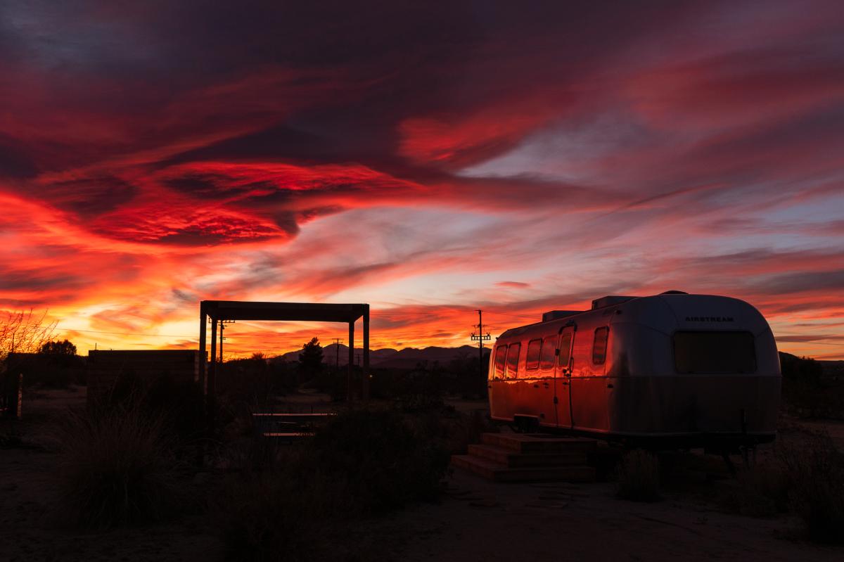 Airstream trailer at sunset in AutoCamp in Joshua Tree, California