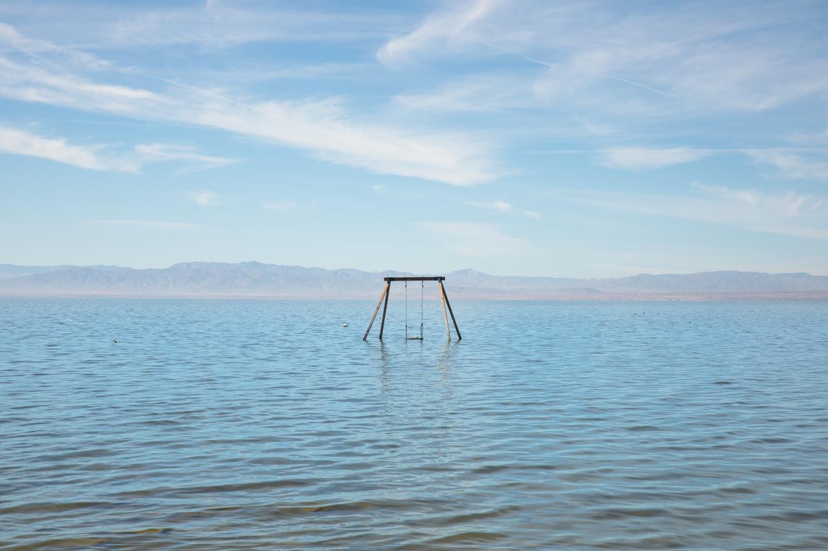 A swing in the water at the Salton Sea State Recreation Area in Bombay Beach, California