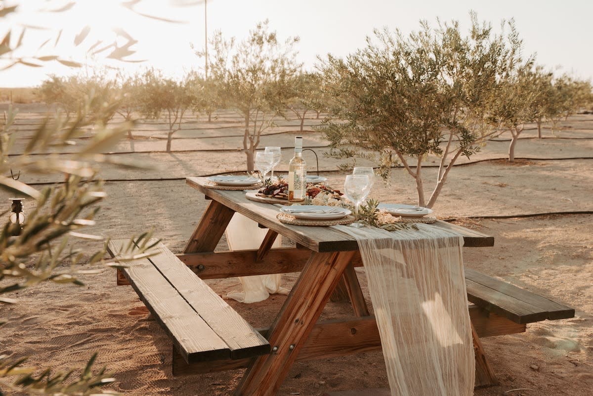 Outdoor dining area at Joshua Tree Olive Oil Farm in Joshua Tree, California