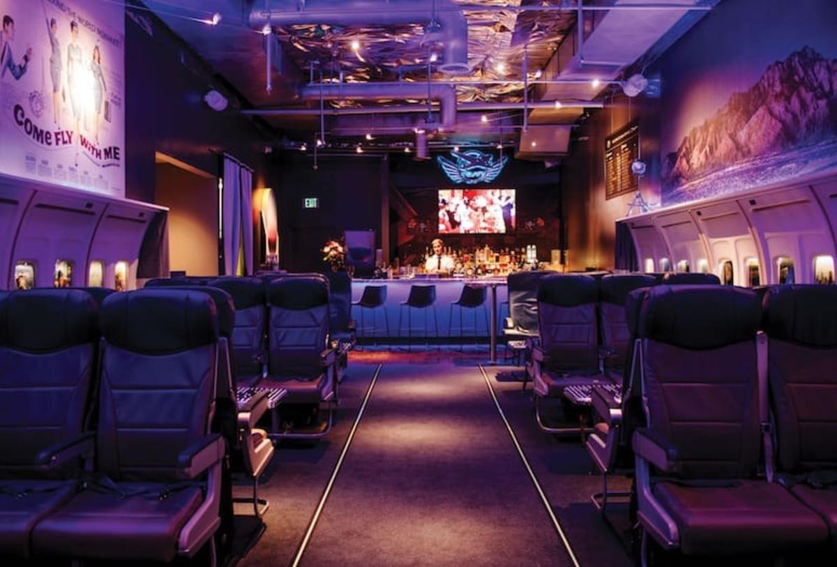 Overview of a bar with airplane seats