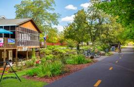 Exterior image of the Cafe at Williams Hardware on the Swamp Rabbit Trail.