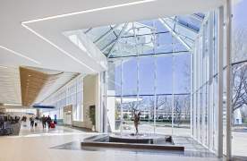 GSP International Airport lobby. There are floor to ceiling windows with a blue sky outside.