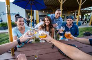 Refreshing beer means smiles all around when it's spent in good company at Southernside Brewery in Greenville, SC.