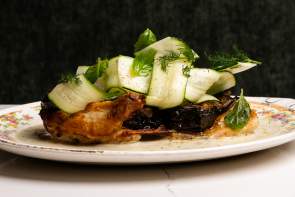 Plated chicken dish at Scoundrel