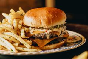 A Dirty Rotten Scoundrel Burger from French restaurant Scoundrel in downtown Greenville, SC.