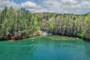 With 18,500 acres of water and a 300-mile shoreline, Lake Keowee is a man-made reservoir and a popular for fishing, waterskiing, swimming, camping and picnicking.