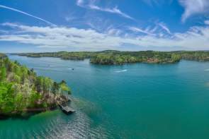 With 18,500 acres of water and a 300-mile shoreline, Lake Keowee is a man-made reservoir and a popular for fishing, waterskiing, swimming, camping and picnicking.
