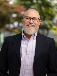 Van Satterfield Headshot in Falls Park on the Reedy on a sunny summer day