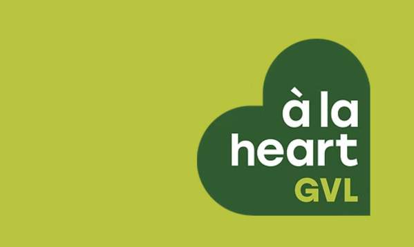Bright greenish yellow background with dark green A La Heart GVL Logo