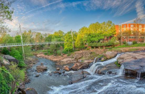 The Liberty Bridge at Falls Park on the Reedy in Greenville, SC on a sunny day