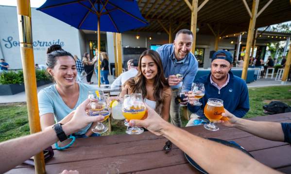 Refreshing beer means smiles all around when it's spent in good company at Southernside Brewery in Greenville, SC.
