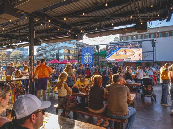 Fans watching the 2023 SEC Women's Basketball Tournament being televised at Yee-Haw Brewing Co. in Greenville, SC.