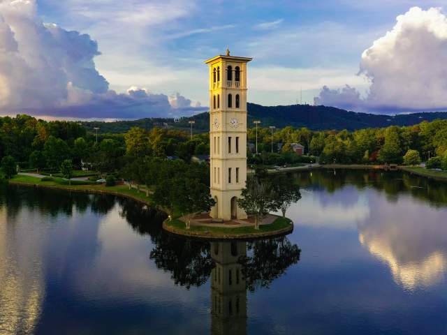 The bell tower overlooking a lake at Furman University in Greenville, SC.