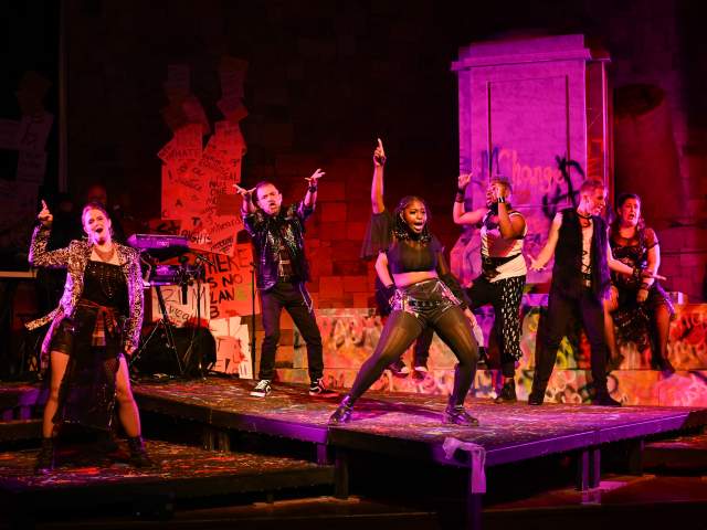 Actors performing at the Glow Lyric Theatre
