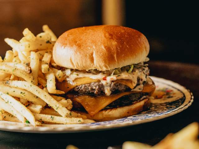 A Dirty Rotten Scoundrel Burger from French restaurant Scoundrel in downtown Greenville, SC.