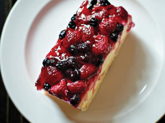 A turo berry torte smothered in blueberries and raspberries from Old Europe Desserts in Greenville, SC.