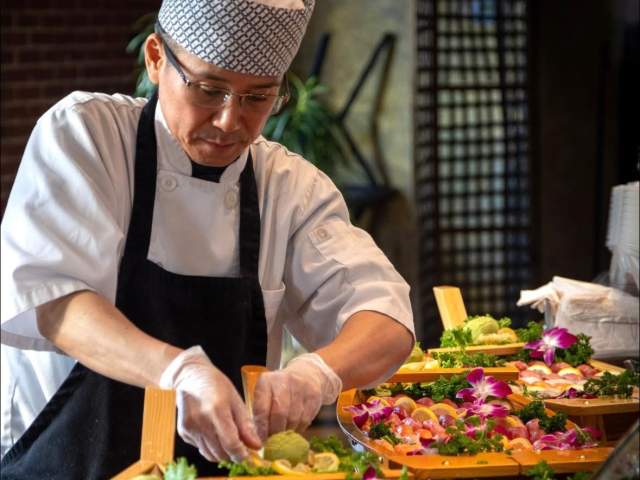 Sushi Go USA, owner, Max Godo, plating sushi