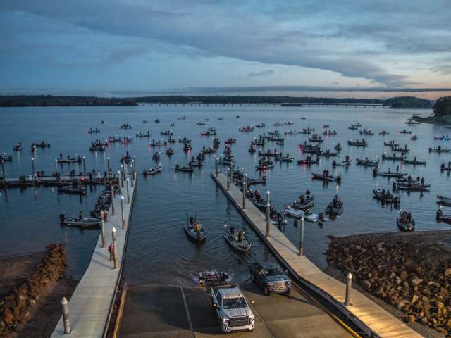 Fishing boats await the start to the Bassmaster Classic tournament at sunrise on Lake Hartwell in Anderson, South Carolina.