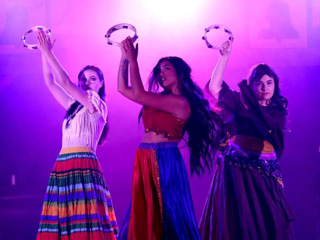 Three women performing in a production of "The Hunchback of Notre Dame" as put on by the Mauldin Theatre Company in Mauldin, SC.