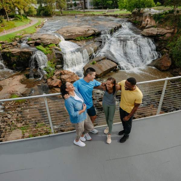 Friends atop the Liberty Bridge & Reedy River Falls