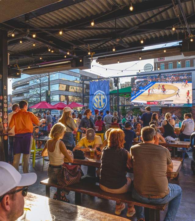 Fans watching the 2023 SEC Women's Basketball Tournament being televised at Yee-Haw Brewing Co. in Greenville, SC.