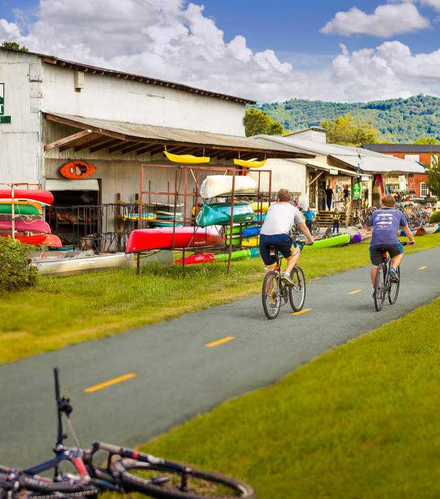 Exterior view of the Swamp Rabbit Trail in front of Sunrift Adventures shop.