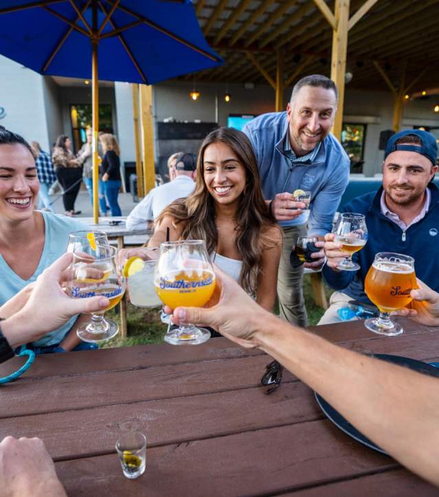 Refreshing beer means smiles all around when it's spent in good company at Southernside Brewery in Greenville, SC.