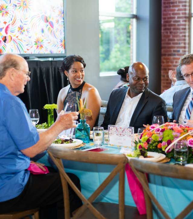People sitting together at a Dinner Event