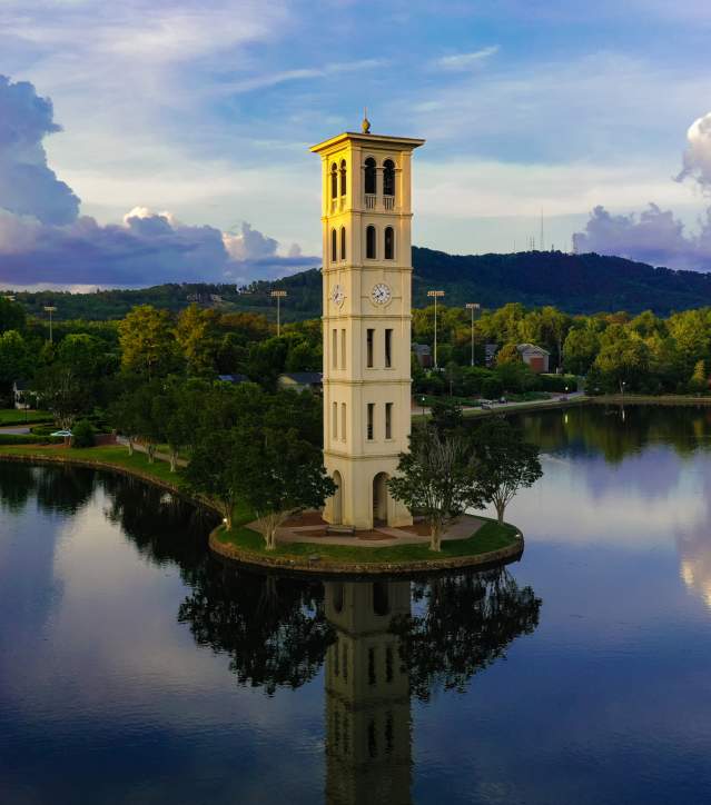 The bell tower overlooking a lake at Furman University in Greenville, SC.