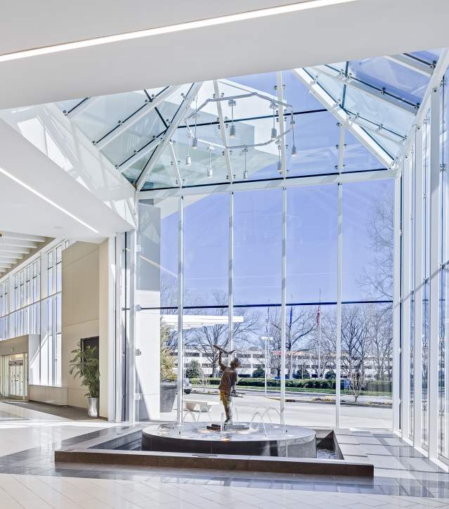GSP International Airport lobby. There are floor to ceiling windows with a blue sky outside.