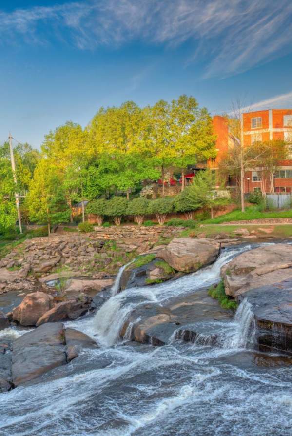 The Liberty Bridge at Falls Park on the Reedy in Greenville, SC on a sunny day
