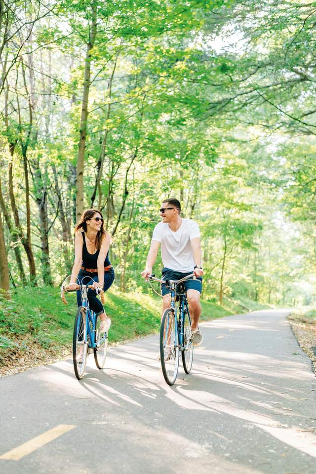 A couple enjoys the great outdoors on the Prisma Health Swamp Rabbit Trail