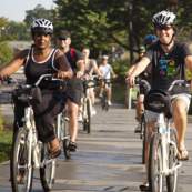 Bikers riding along the Greenville Health System Swamp Rabbit Trail