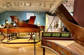 showroom of grand pianos
