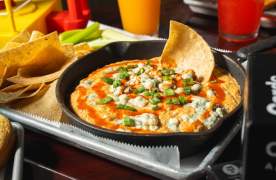 Yummy cheese dip and nachos from Local Cue in Greenville, SC.