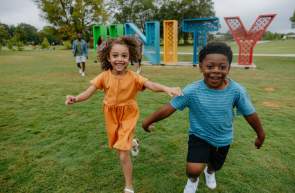Kids run around in pure joy at Unity Park in downtown Greenville, SC.